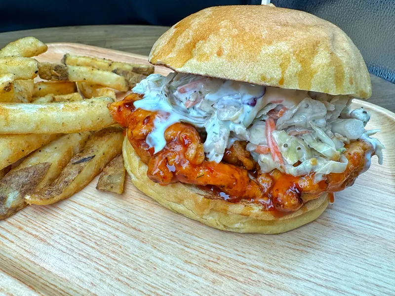 A crispy chicken sandwich and fries at Liv's Tavern